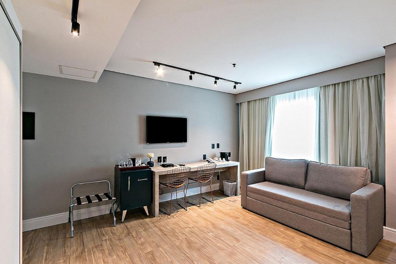 You Stay At Vila Olimpia - Itc Sao Paulo Exterior photo A living room with a track lighting system