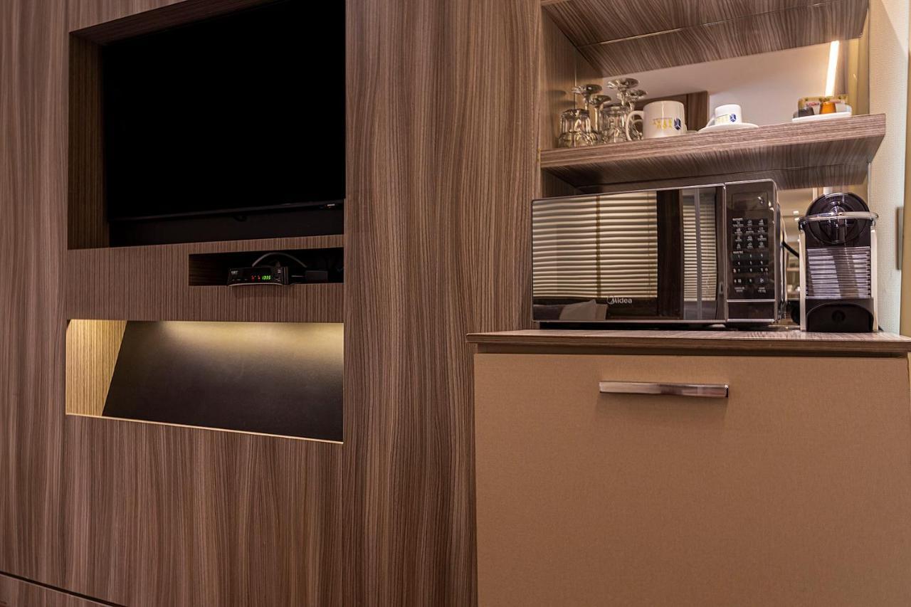 You Stay At Vila Olimpia - Itc Sao Paulo Exterior photo A Nespresso machine in a hotel room